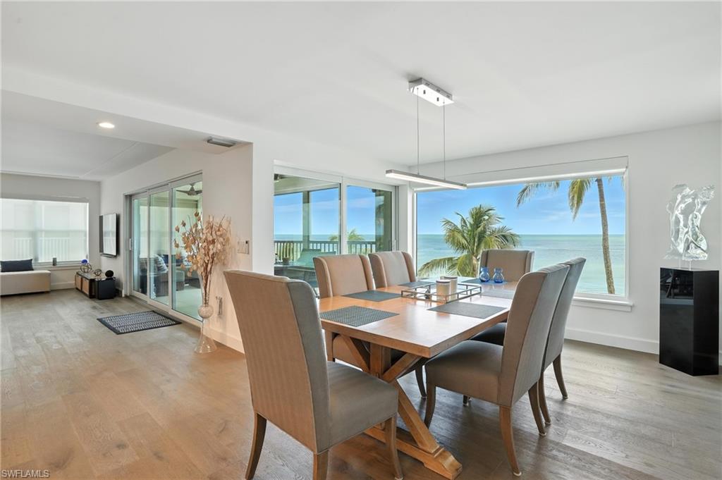 Dining area featuring wood finished floors and recessed lighting