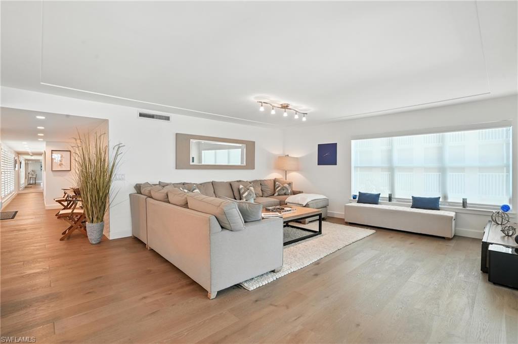 Living room featuring light wood-style flooring