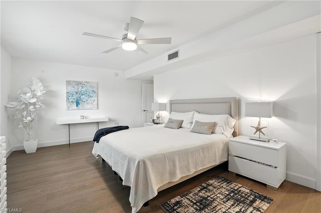 Bedroom featuring wood finished floors and ceiling fan