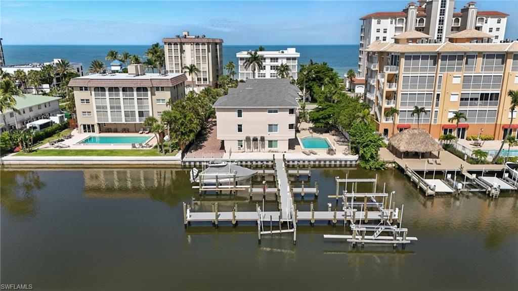 Aerial view of a large body of water and a pool area