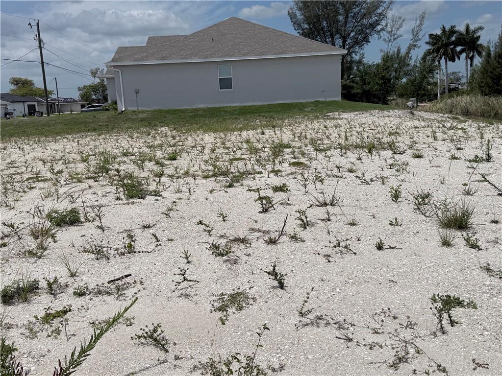 facing east, west side of property