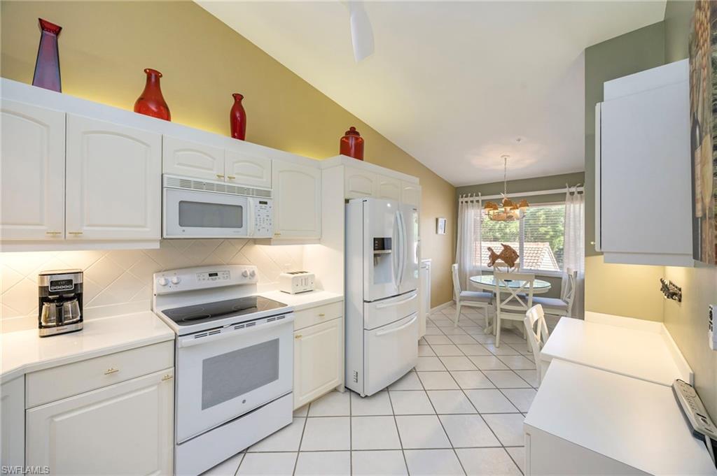 Extra upper cabinets above the built-in desk