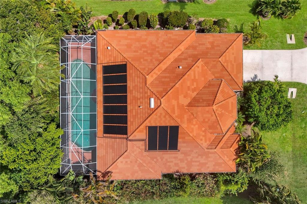 Aerial view of the home...tile roof was replaced in 2019.