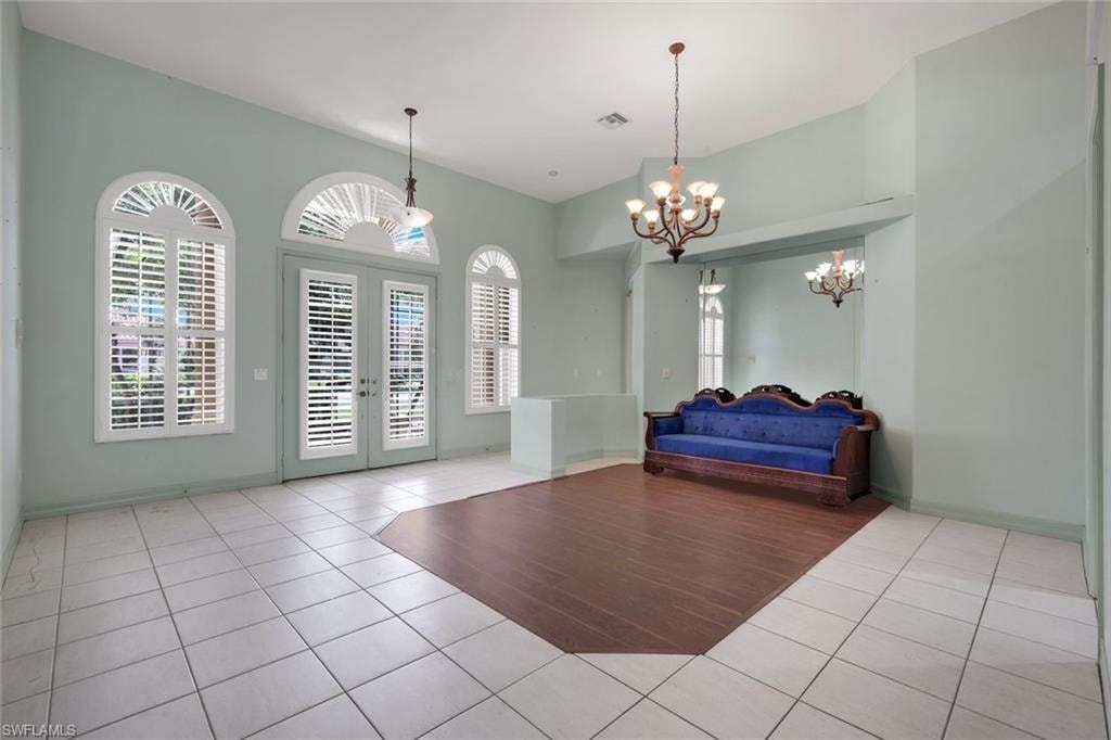 Grand entry way is sure to impress!  Notice the volume ceilings.