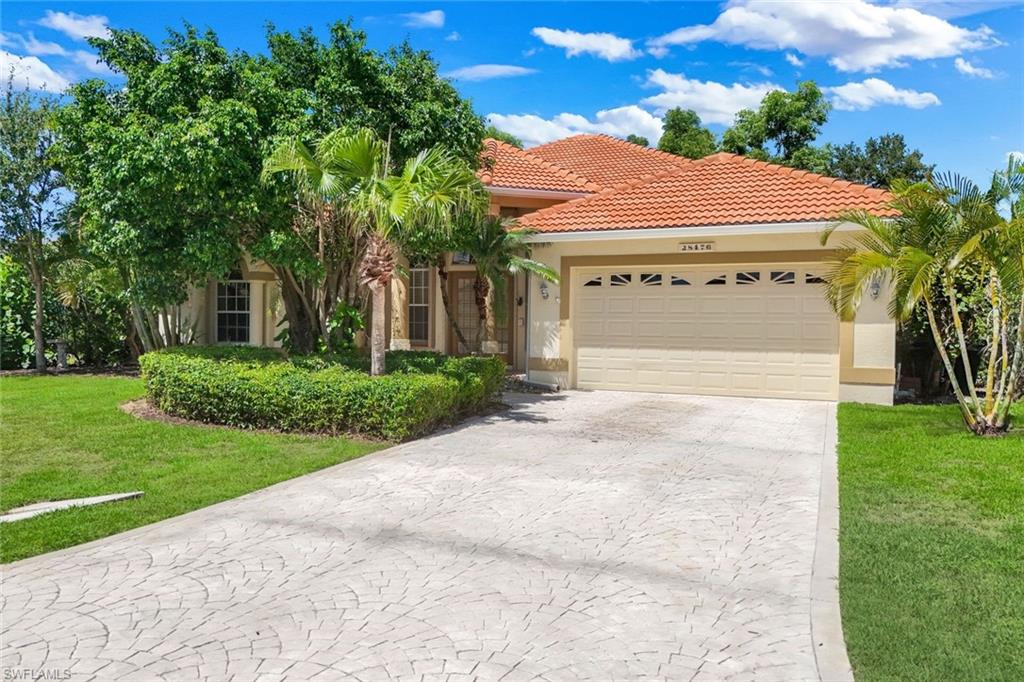 Home features a large two car garage.