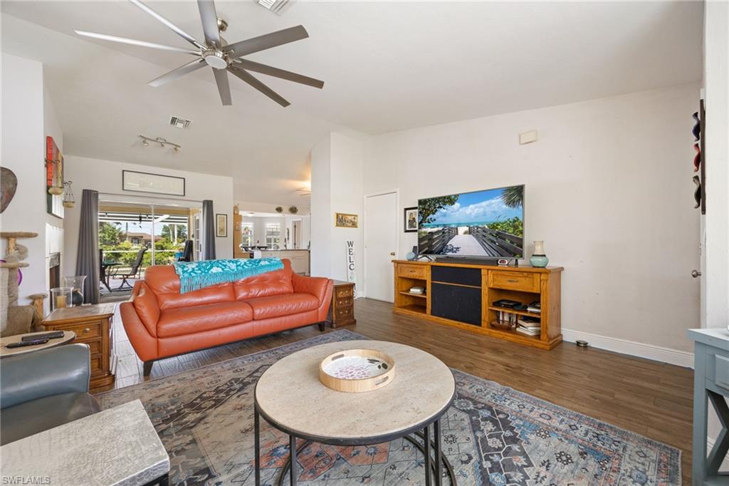 Living room with TV and Fan