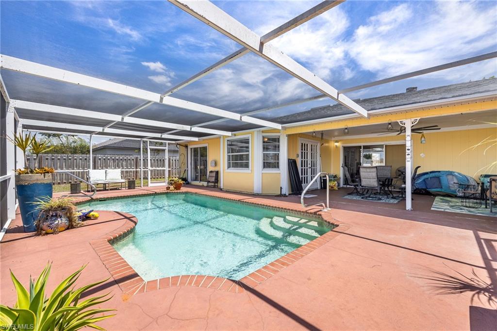 Screened in Lanai with pool and large entertaining area