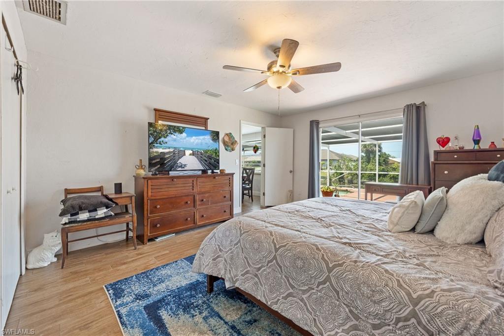 Primary Bedroom overlooking back pool, canel area.
