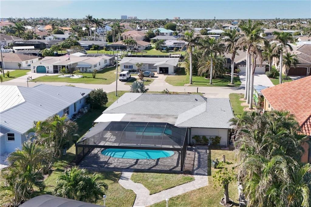 View from above of property featuring a pool