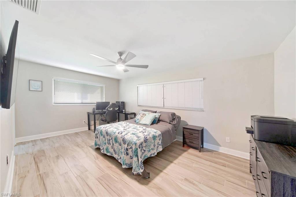 Bedroom featuring light wood finished floors and ceiling fan