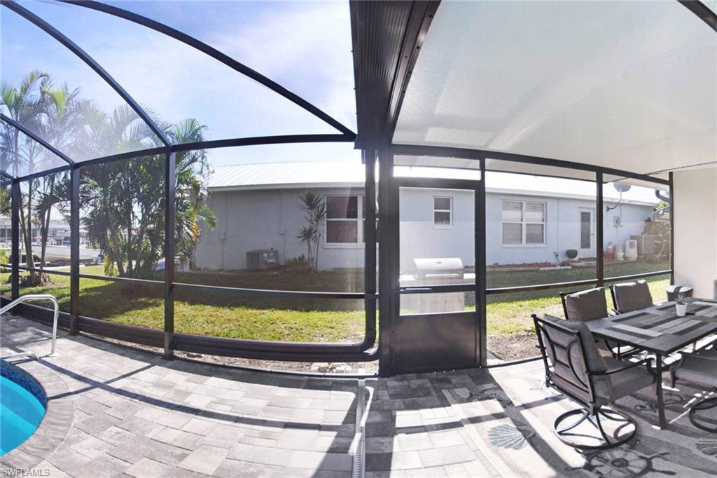 Sunroom / solarium featuring outdoor dining space