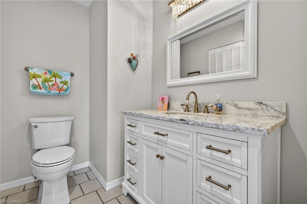 Bathroom featuring vanity and light tile patterned floors