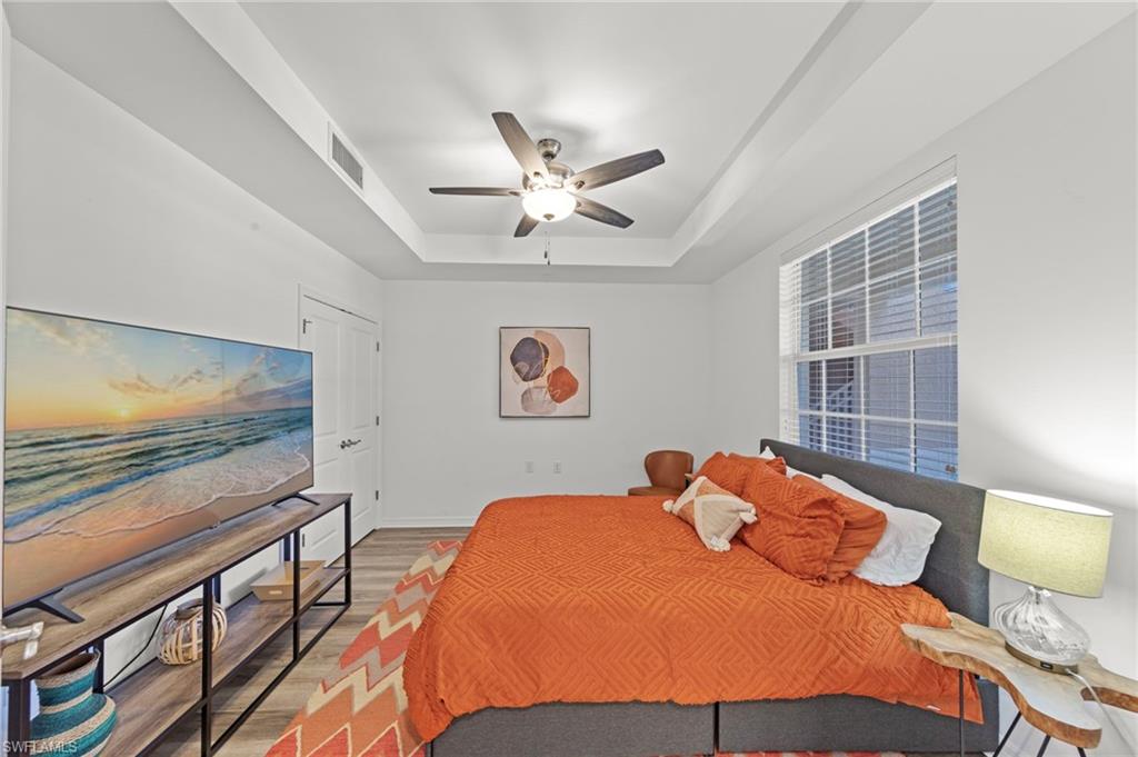 This property features white walls, a ceiling fan, and recessed lighting