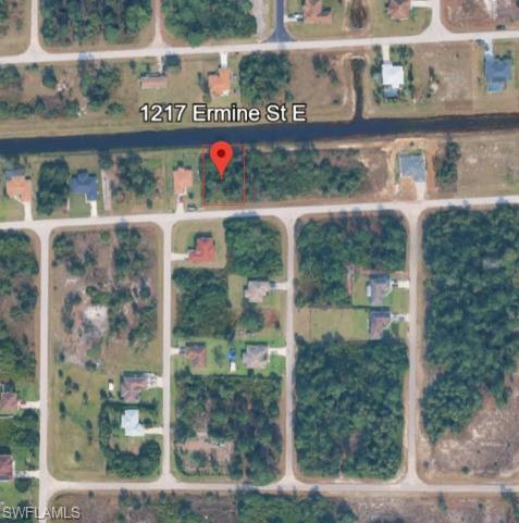 Aerial view of property's location with property parcel outlined
