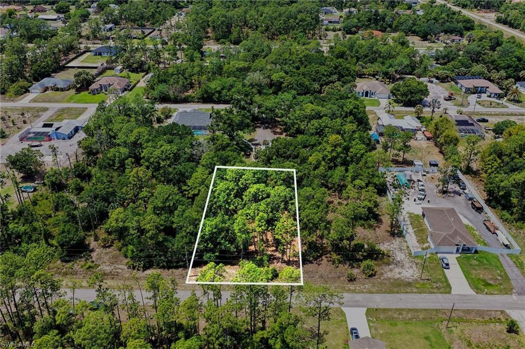 711 Wellington Ave Lehigh Acres FL - lot outlines are approximate and buyer to verify with survey or other means