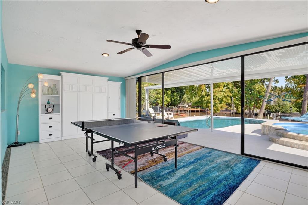 Den open to pool area