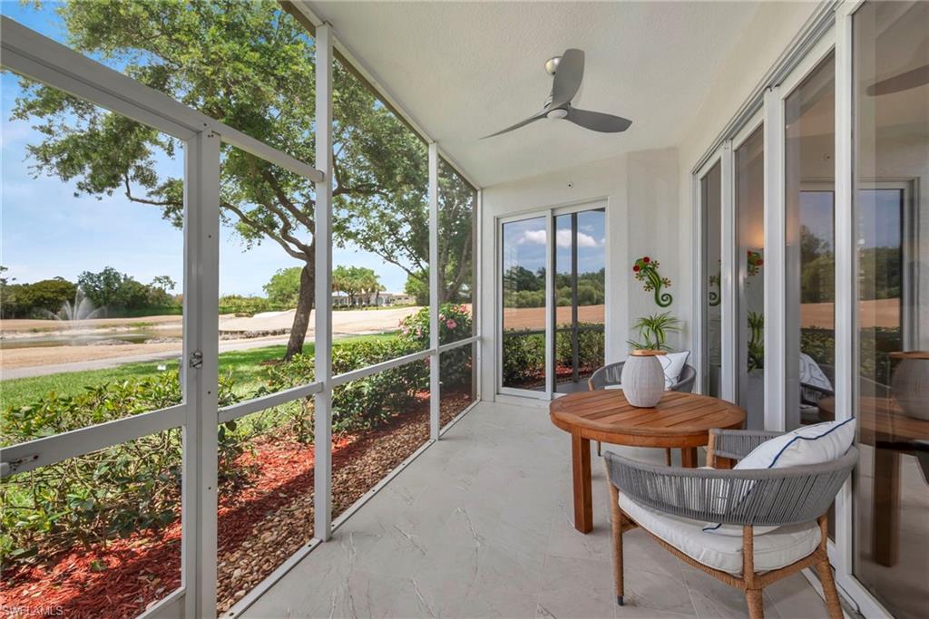 Lanai overlooking lake with water feature and  golf course