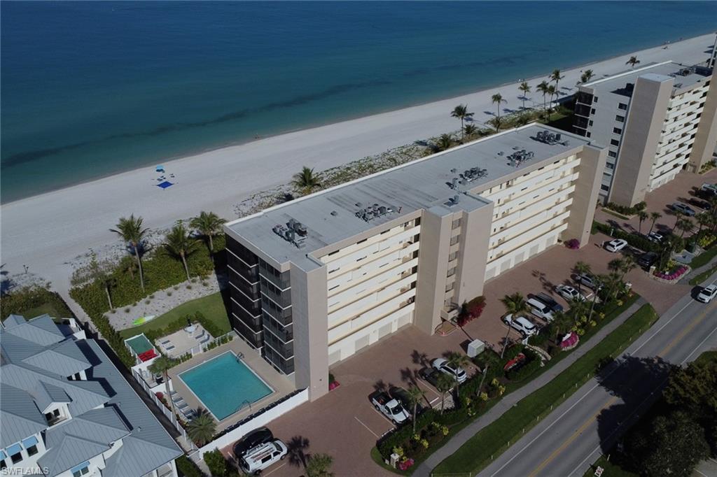 Beachfront condominium building with direct access to a sandy beach