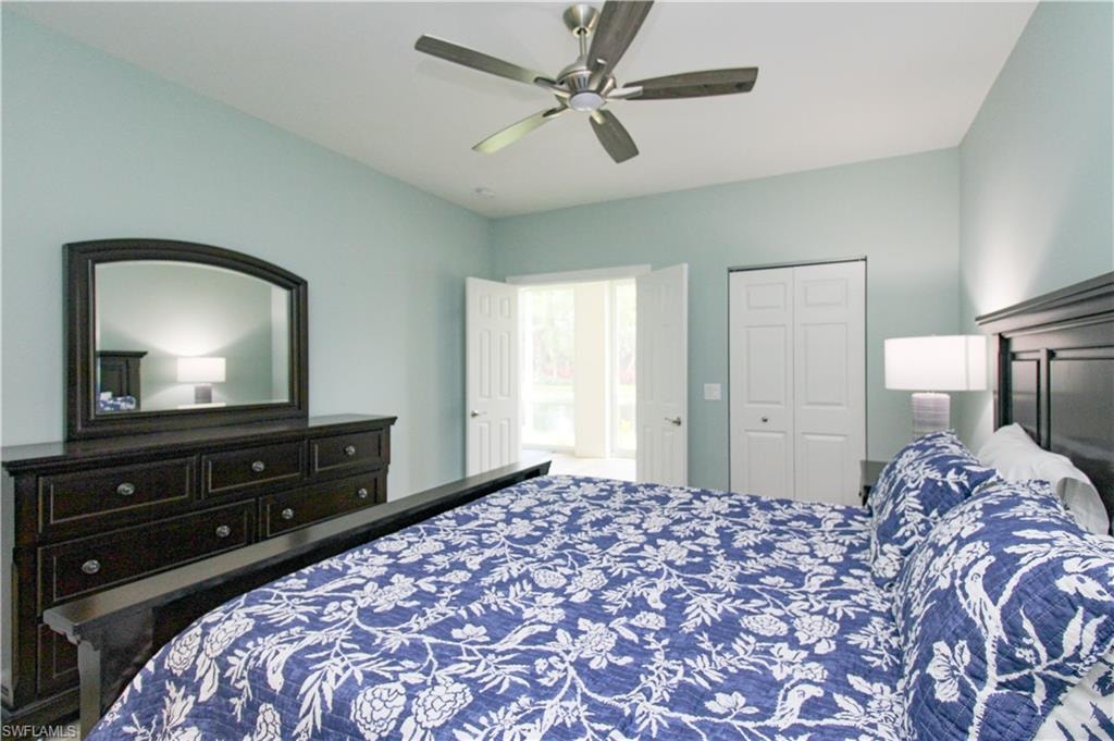Bedroom featuring a closet and ceiling fan