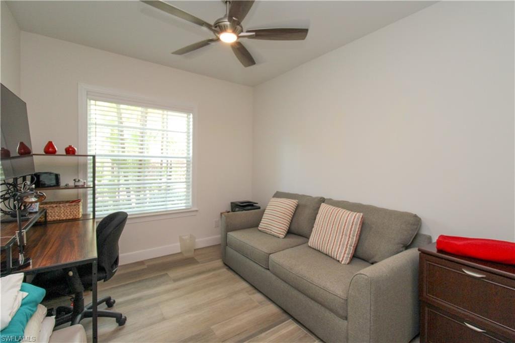 Office featuring light hardwood / wood-style floors and ceiling fan