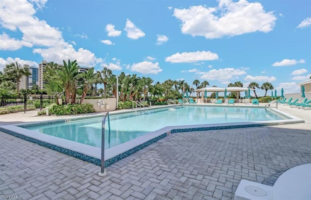 Community pool featuring a patio area