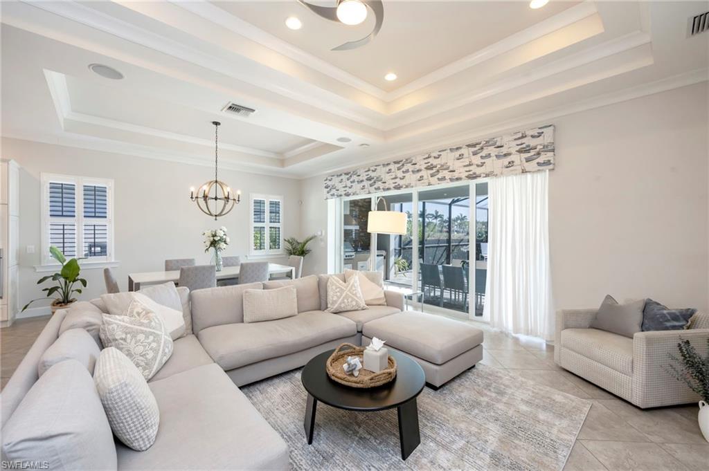 Impact glass windows throughout, plantation shutters on all the windows and custom valances