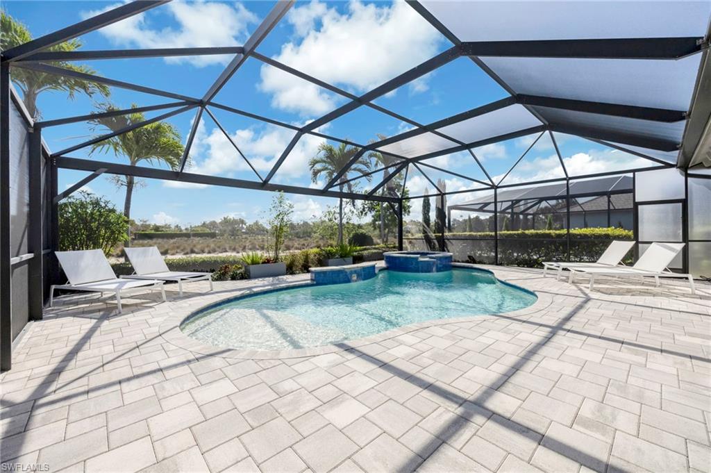 Enjoy the water view through the picture window screen enclosure
