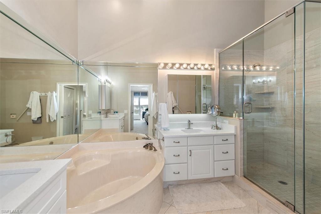 Master Bathroom with new separate dual sinks, vanities, quartz counter tops and fixtures