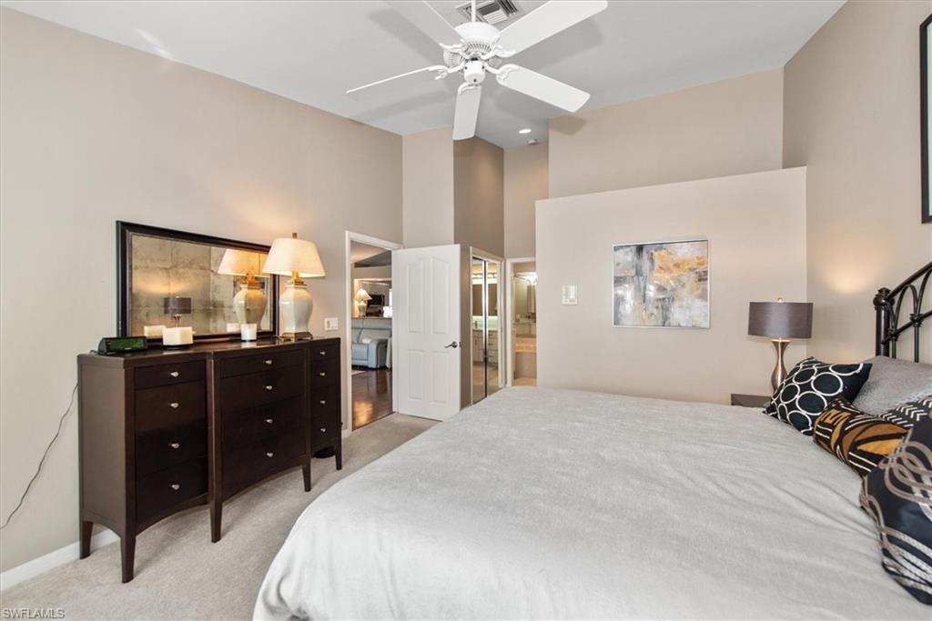 Master Bedroom with King size bed, volume ceilings and walk in closets