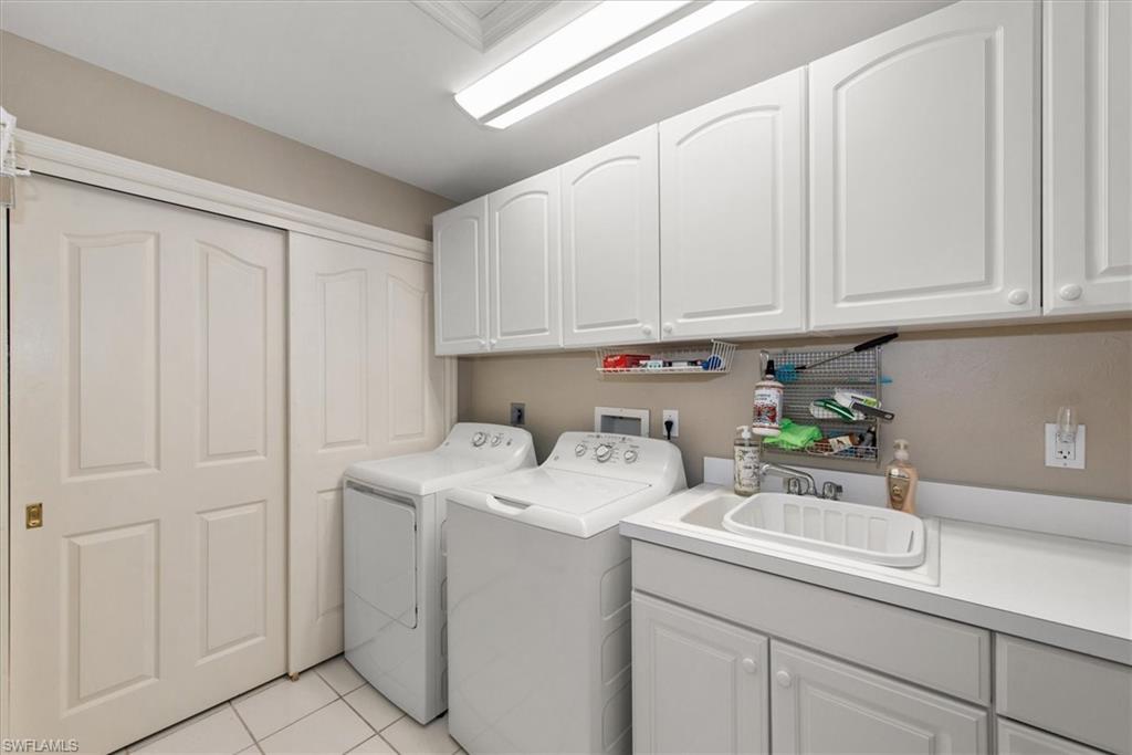 Laundry Room with tons of extra storage - hot water heater installed in 2024