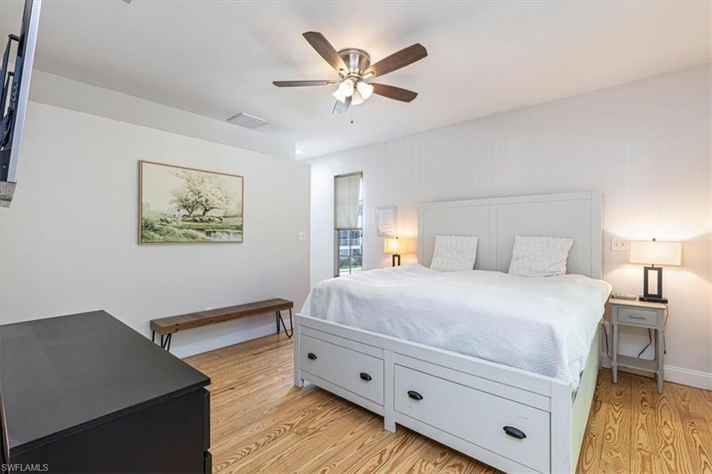 Bedroom featuring light wood-style floors and ceiling fan