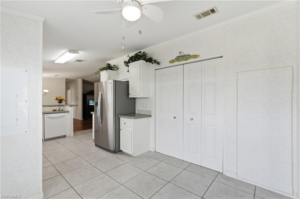 Across from breakfast area. Doors to washer and dryer.
