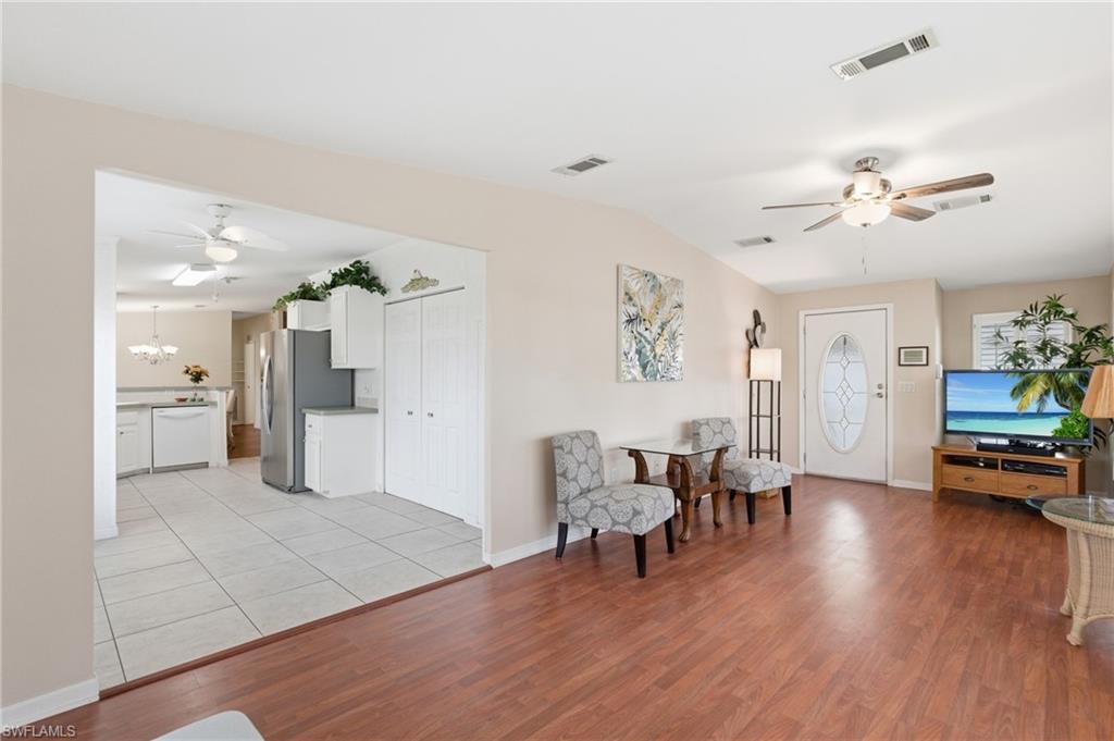 Living room and entrance to kitchen area