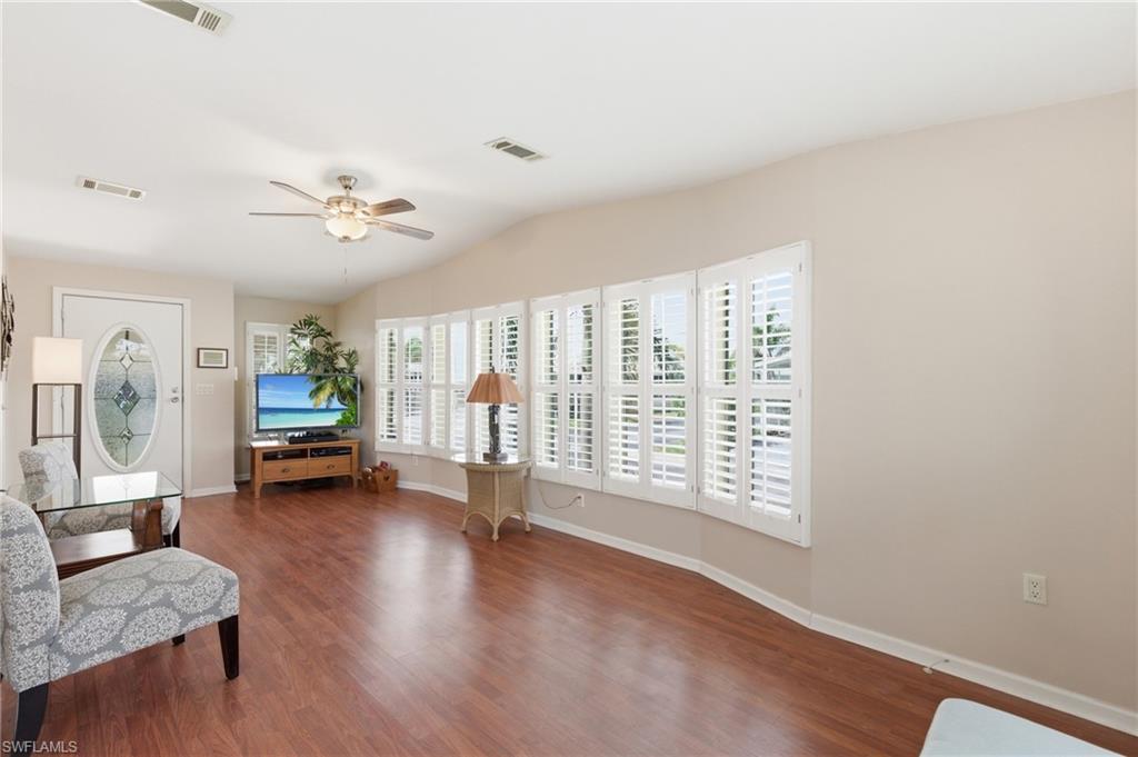 Living room and door to car port.