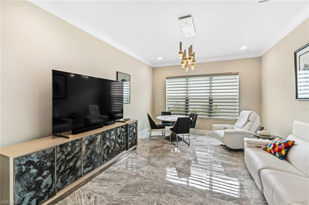 The spacious den offers flexibility for a home office, media or hobby space