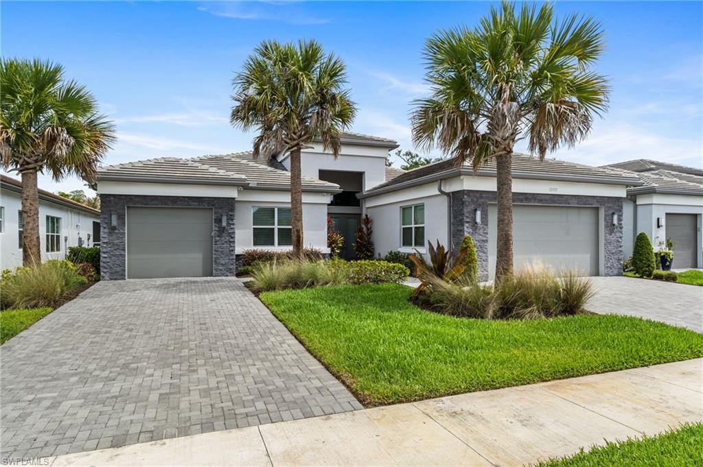 Curb appeal with dual driveways for the 3 car garage space.