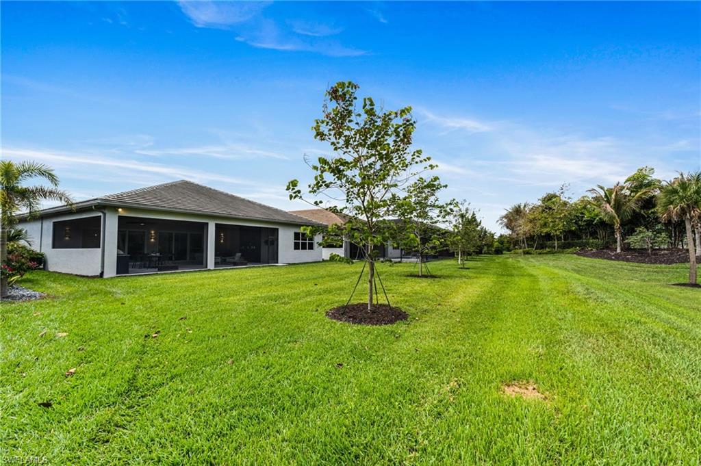 Perfectly positioned on a unique lot with view of rare extended greenspace and serene preserve, this home offers an extraordinary sense of privacy and tranquility.