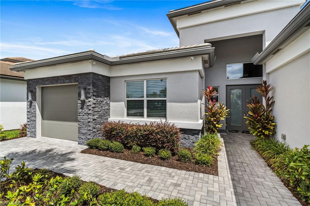 Front entrance features glass doors