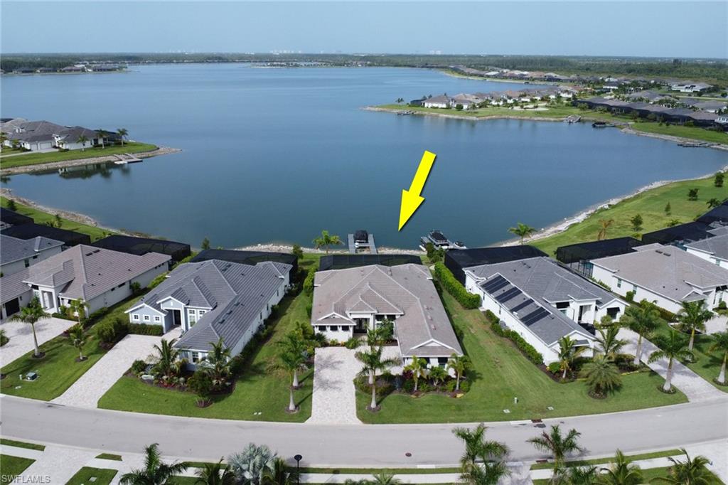 Waterfront property featuring a private boat dock and direct lake access