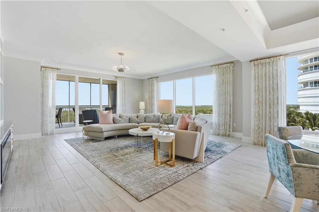 Sophisticated, understated and elegant! Welcome home to your END unit in Bonita Bay's tower of Seaglass.