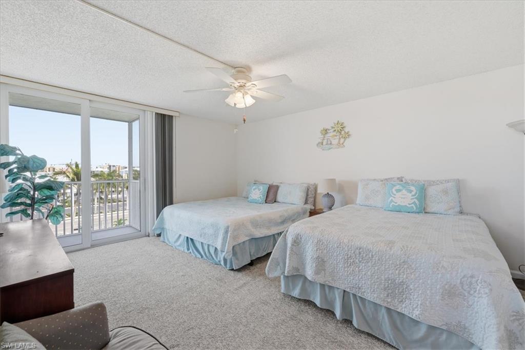 Bedroom 1 - Primary with balcony access