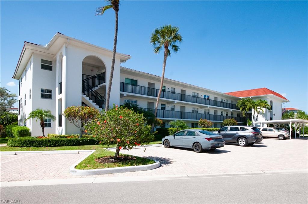 One covered parking space, ample guest parking.