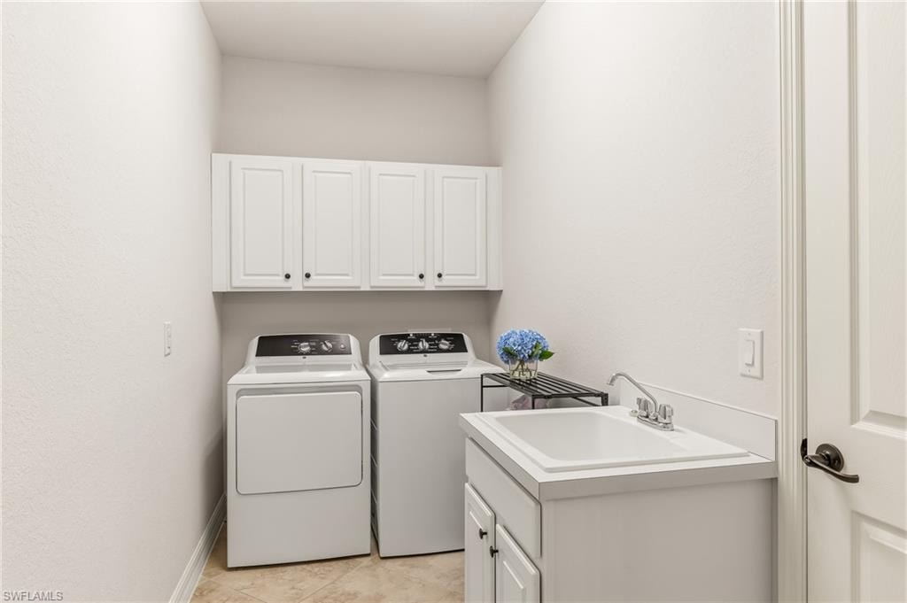 New commercial washer & dryer w/cabinetry & utility sink