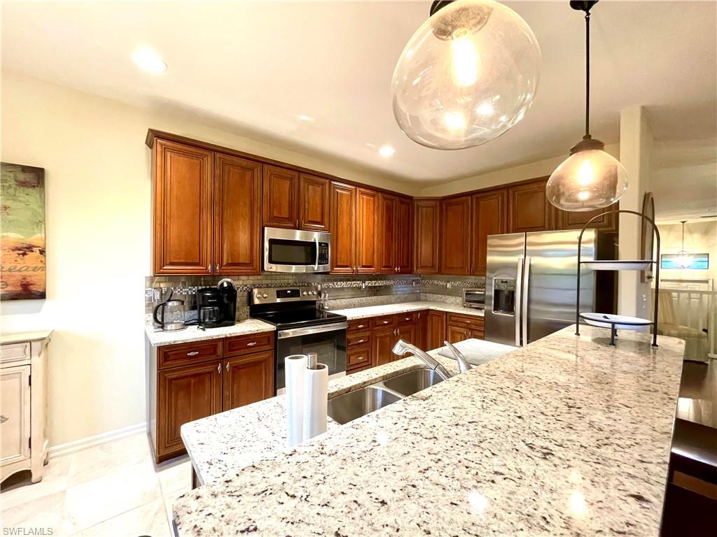 Kitchen with front granite countertop