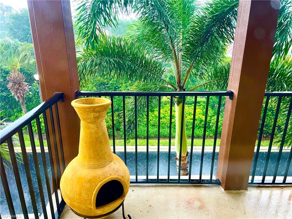 balcony at the primary bedroom overlooking on lush tropical area