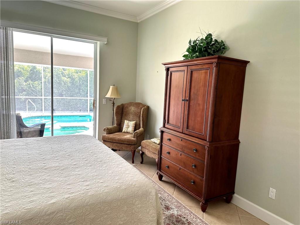 The main bedroom has an en suite, 2 closets, plus a linen closet.  Just outside the sliders is a lovely sitting area.