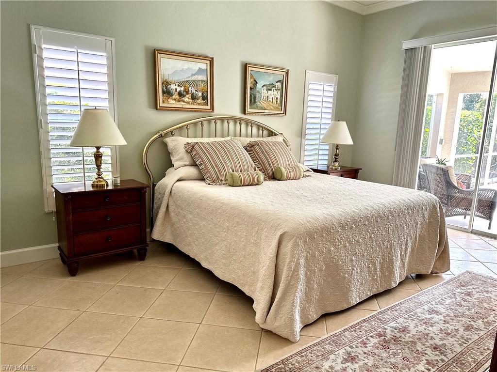 The main bedroom has sliders for convenience and added natural light.