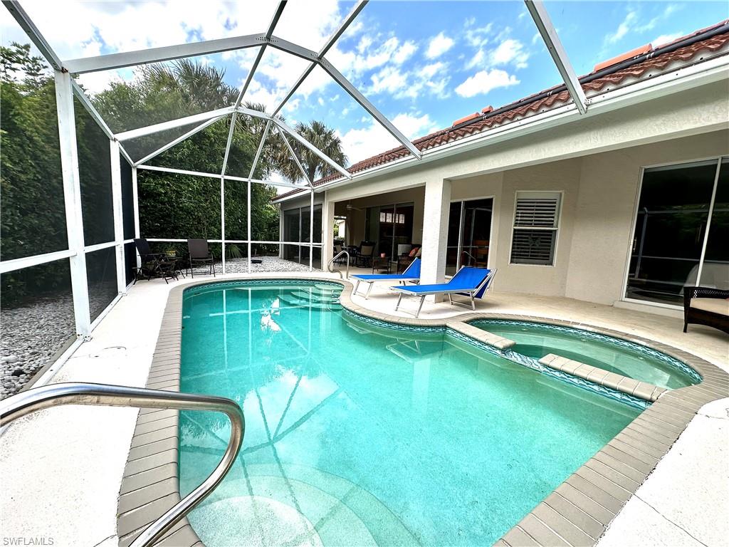 Home is designed for outdoor living with a pool and patio area that extends the full length of the house.