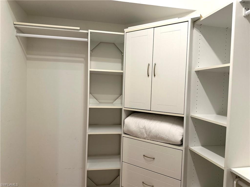 The main suite has a walk-in closet, plus a standard 6' closet.  This is the left side of the walk-in closet.