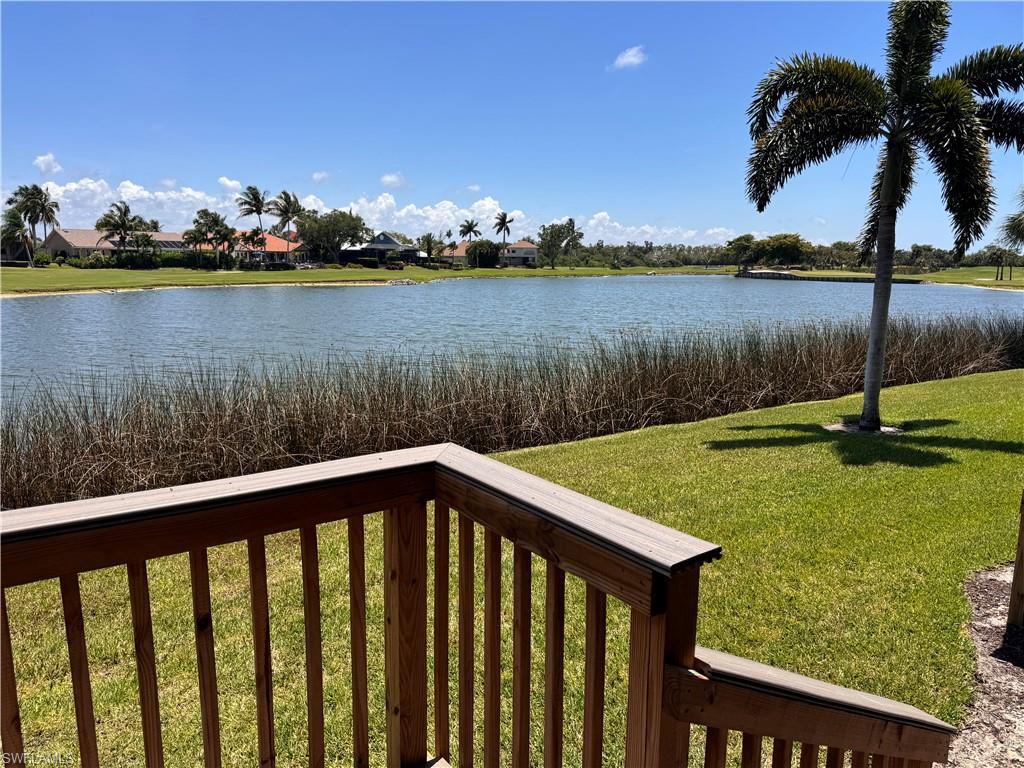 Expansive waterfront setting featuring a tranquil lake with natural reeds